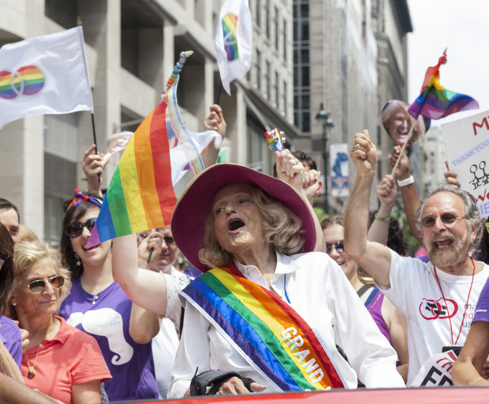 Edith "Edie" Windsor at the 43rd Annual Pride Parade in New York. She is wearing a rainbow sash.